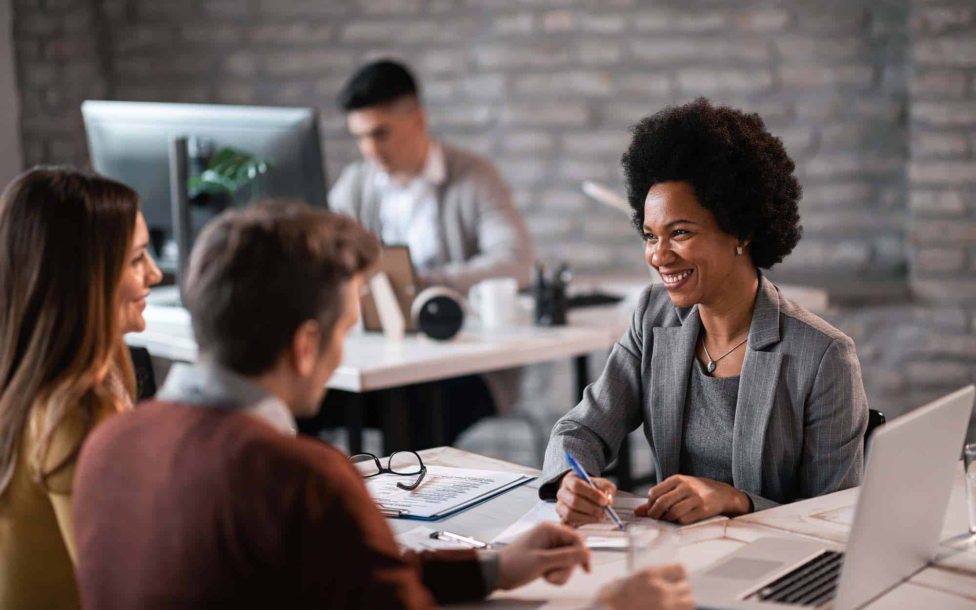Financial Advisor Talking to Business Owners
